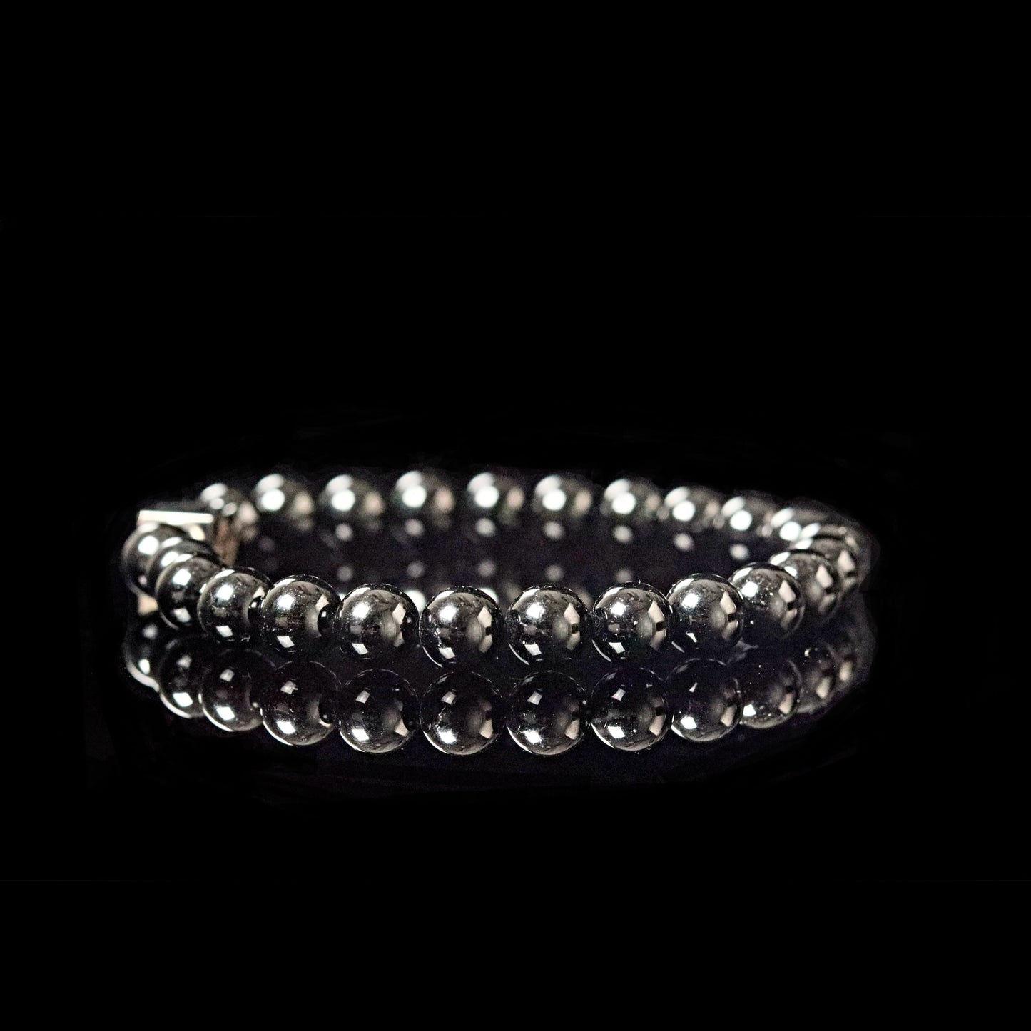 Black Onyx 8mm polished silver reflection angle - classic protection stone bracelet
