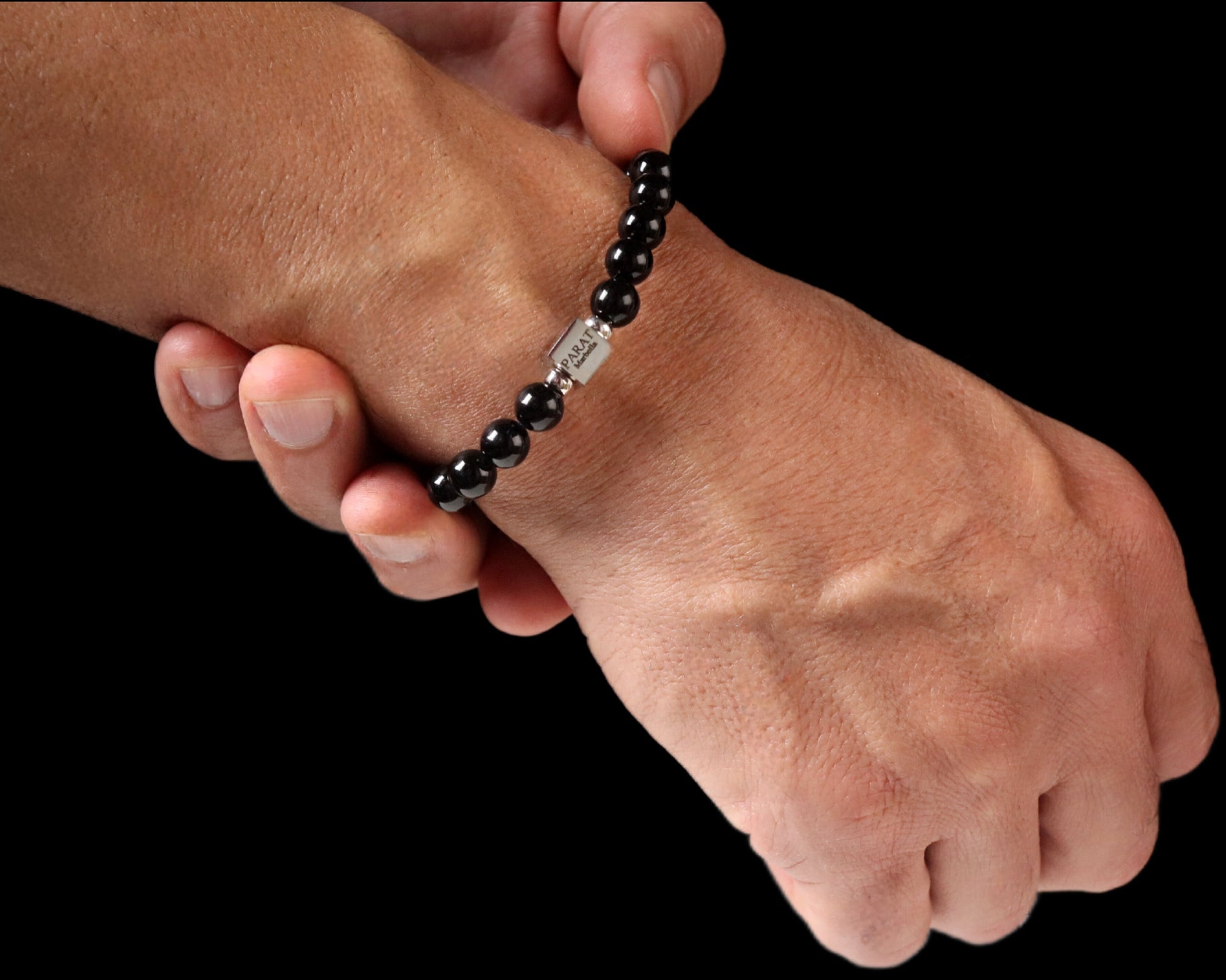 Sterling silver PARAT cube on Black Onyx 8mm bracelet worn - masculine protection jewelry