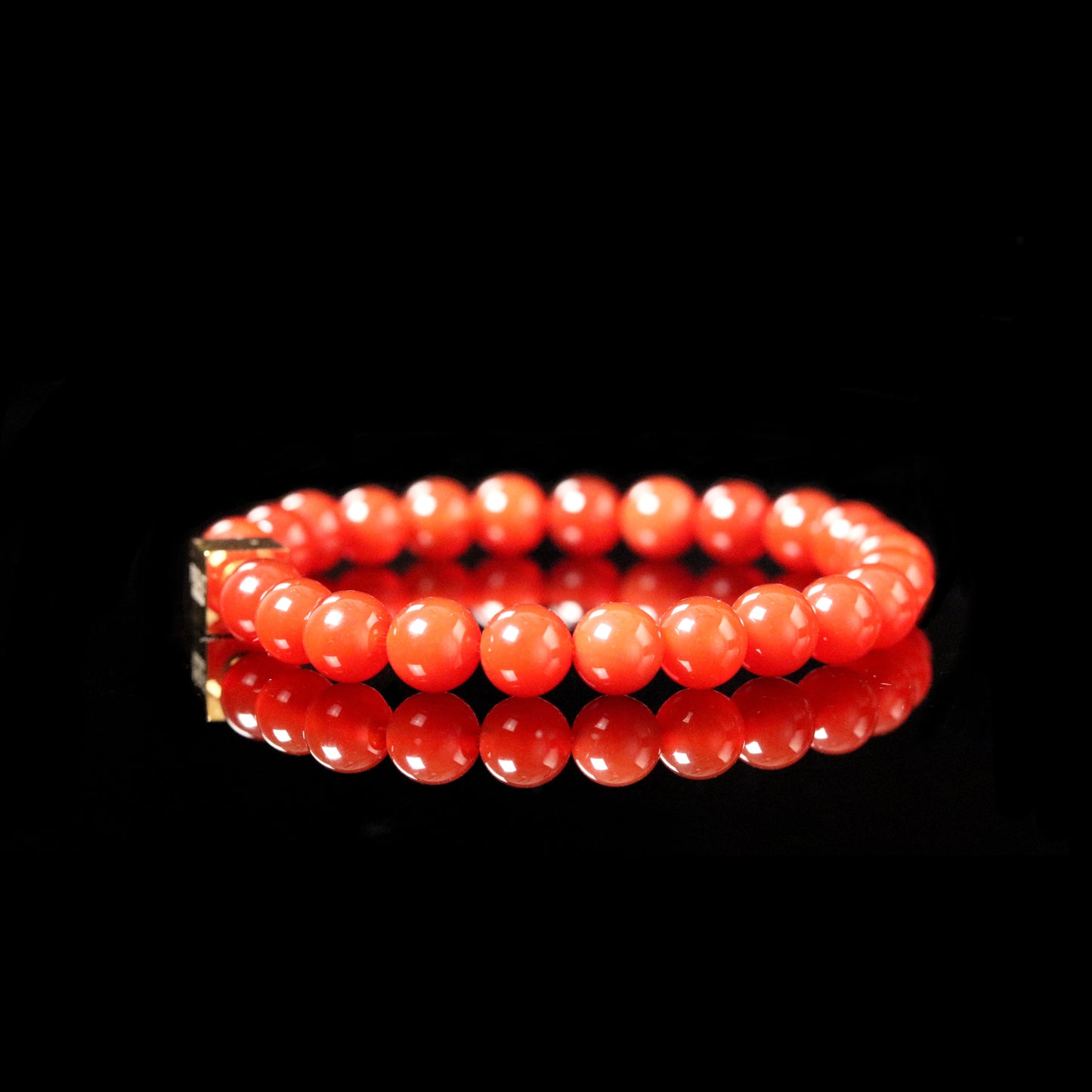 Carnelian vibrant fire orange bracelet reflection - warrior stone luxury jewelry