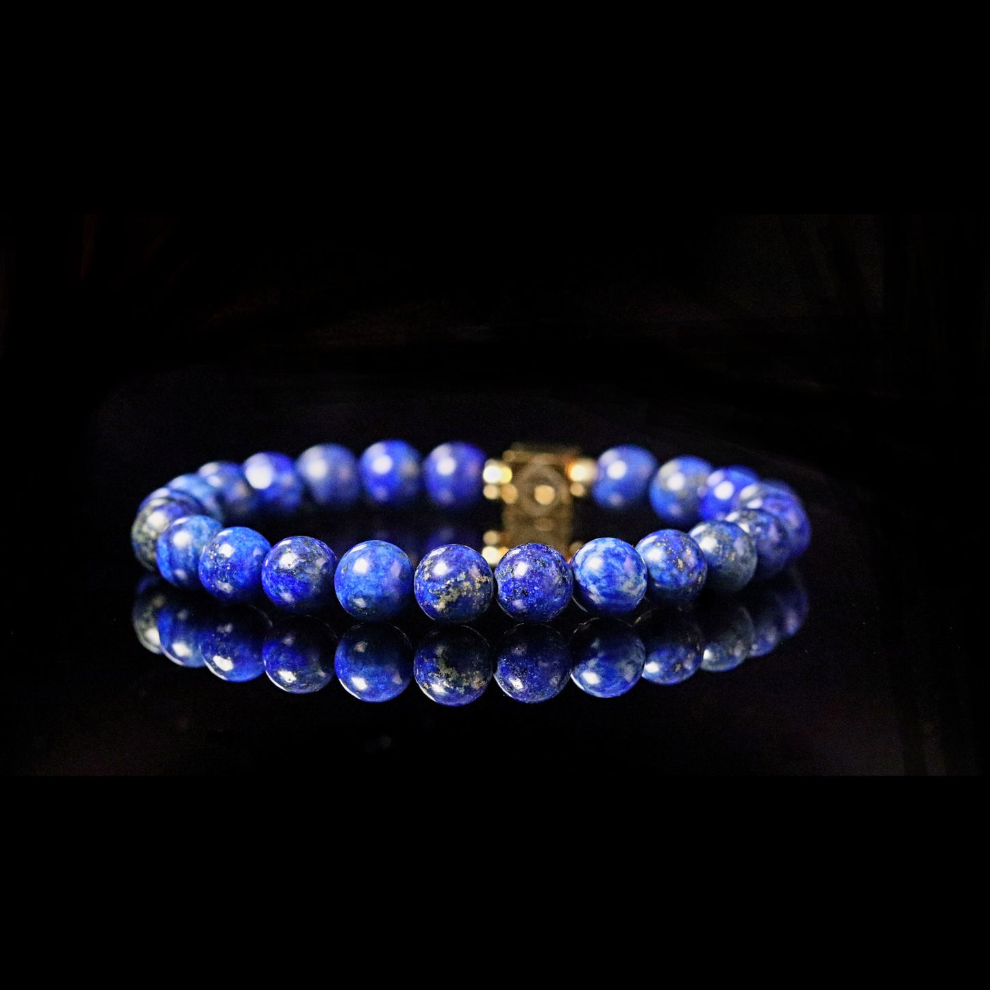 Lapis Lazuli bracelet 14K gold angle view - royal blue stone of wisdom