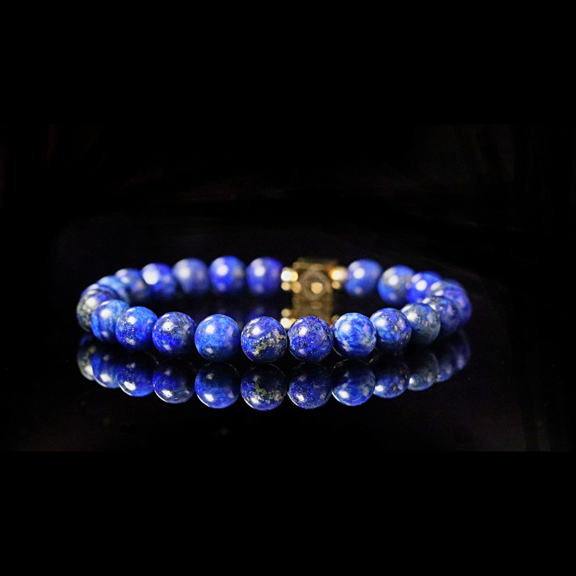 Lapis Lazuli bracelet 14K gold angle view - royal blue stone of wisdom
