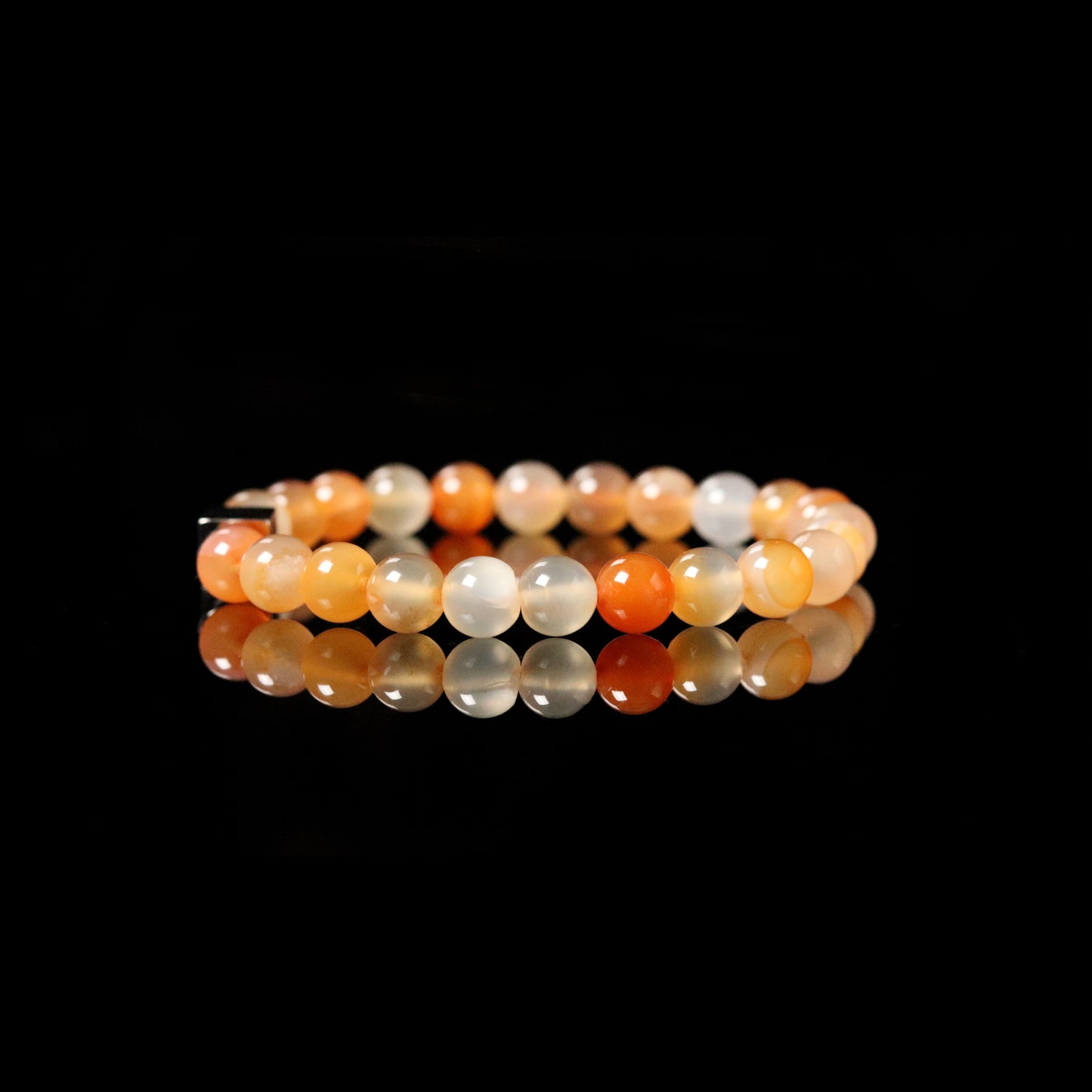 Sterling silver PARAT cube angle view detail on Peach Agate harmony stone bracelet 8mm