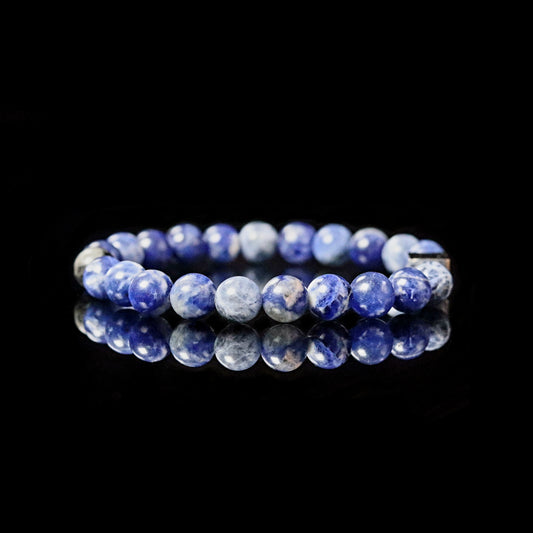 Sodalite royal blue bracelet reflection - deep blue gemstone white patterns
